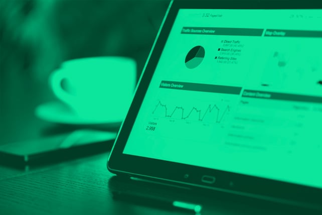 Tablet showing data charts imported from Google Analytics